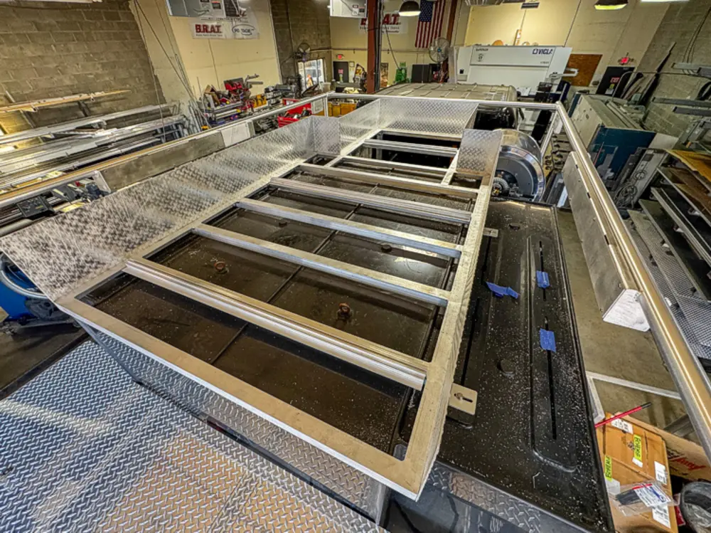 Open compartment interior during fabrication, photo 84 of 303.